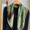 Soft satin scarf for women, showcasing a beautiful green hue and exquisite print.