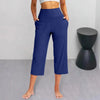 Chic high-waist wide-leg capri yoga pants with pockets, perfect for activewear and casual outings in nylon-spandex blend.