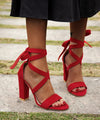Sophisticated emerald green stiletto heels with a sleek design.
