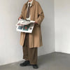 Chic Japanese vintage trench coat for men in black, featuring a single-breasted closure and stylish turn-down collar.