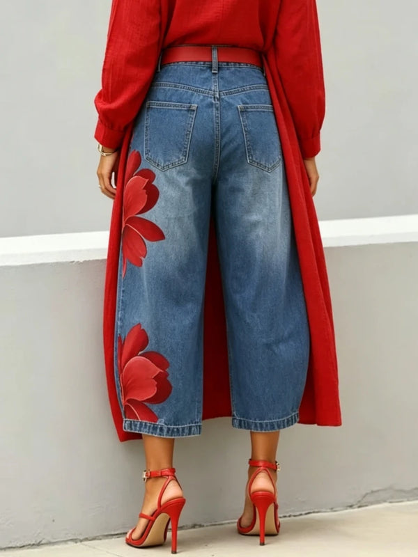 High-waisted cropped denim jeans with relaxed wide leg fit and floral texture detail