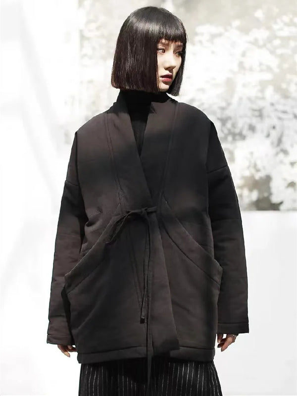 Neutral tone cotton padded outerwear with hood, belt, and pockets for autumn and winter wear
