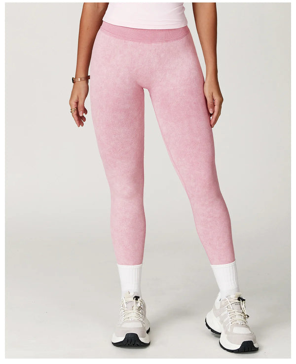 Peach high waist yoga pants featuring a flattering fit.