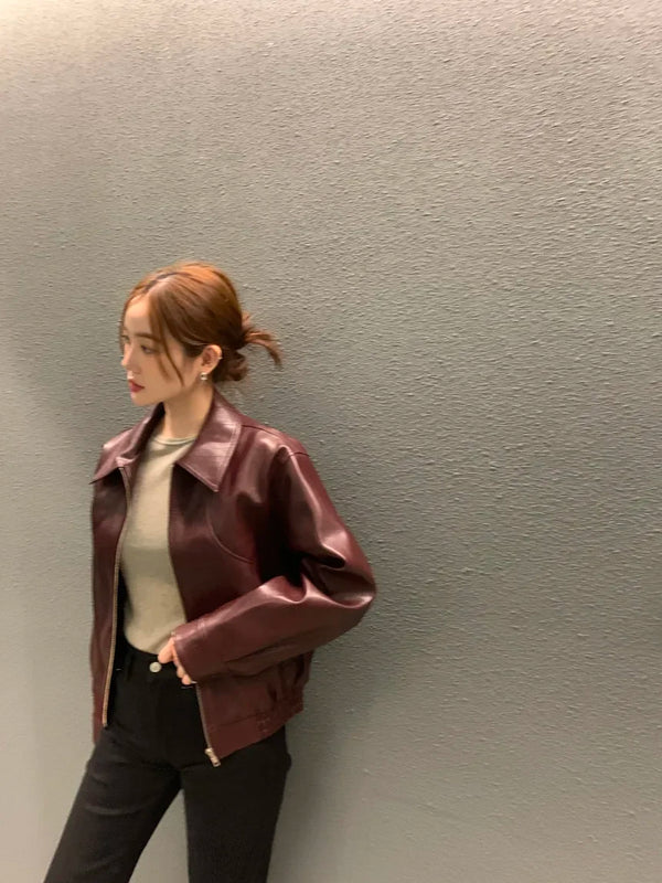 Chic cropped leather jacket for women in premium faux leather with turn-down collar, perfect for autumn and winter fashion.