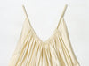 Premium satin party top with flattering pleats and bare back detail