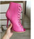 Heel detail of snake-print stiletto ankle boots showing height