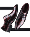 Close-up of the lace-up design on elegant floral men's Oxford shoes.