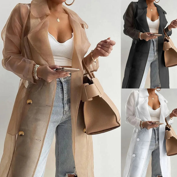 Side view of lightweight belted trench coat showing regular-length cut and movement