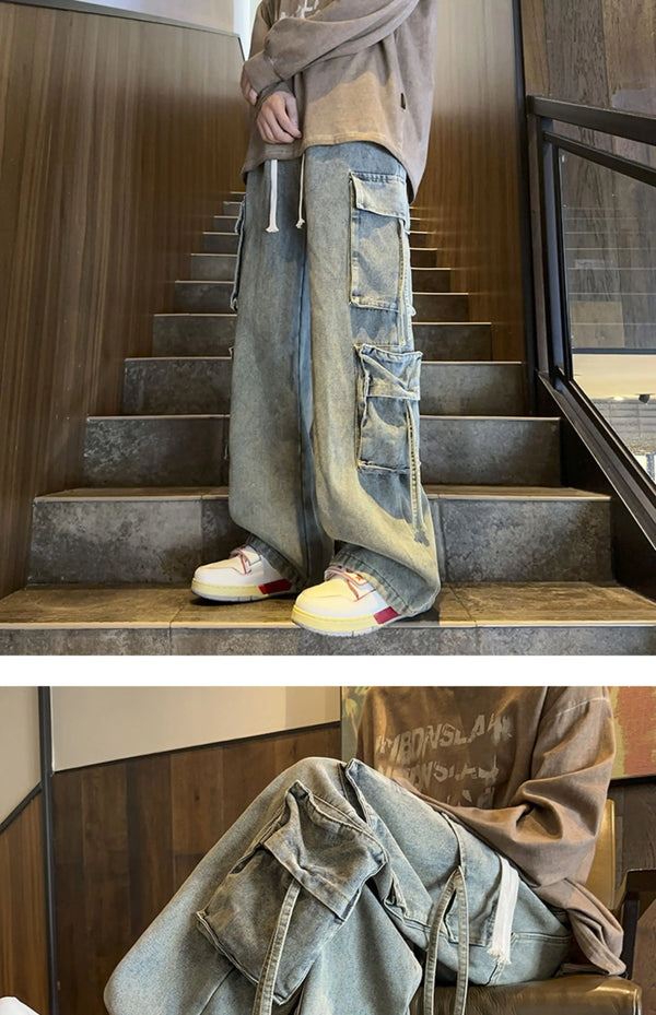 Full-length view of men's wide-leg jeans in coated denim.