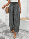 Floral wide-leg chiffon pants for women, ankle-length, elastic waist, perfect for summer fashion and casual chic outfits.