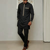 Men's traditional two-piece set featuring authentic African-inspired patchwork panels and prints