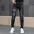 Detail of the waistband and pockets on Midnight Rider Jeans, emphasizing durability.