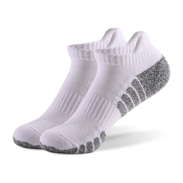 Non-slip grip detail on athletic socks, ensuring stability and preventing shifts during runs.