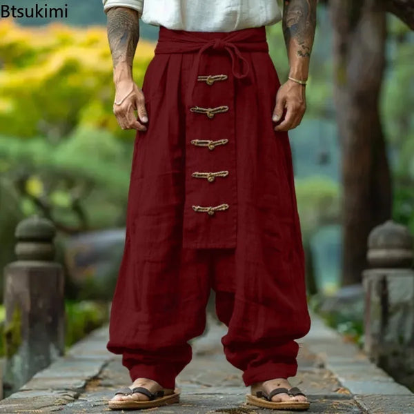 Wine red wide leg trousers with decorative lace-up front and flowing silhouette