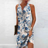 Handcrafted beaded V-neck dress in flowing design perfect for warm weather occasions