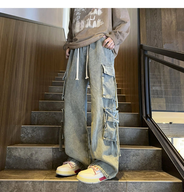 Detail shot of the wide-leg cut on men's hip-hop jeans.