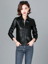 Chic women's sheepskin leather jacket with zippered front, turn-down collar, and pockets for stylish autumn layering.