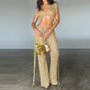 Shimmering two-piece party set with hand-embellished sequins and playful fringe details