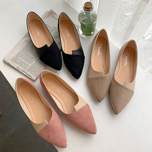 Close-up of soft knitted fabric upper on pointed toe ballet flats showing texture detail