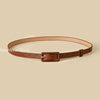 Chic skinny faux leather belt for women in vibrant red, perfect for casual and dressy outfits, featuring a vintage buckle.