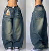 Unisex wide-leg jeans in durable fabric with eye-catching designs.
