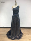 Full-length view of the elegant one-shoulder beaded gown in a grand ballroom setting.
