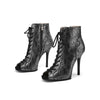 Stylish women's boots with exotic snake print and secure closure