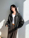 Chic vintage leather cropped jacket for women in a timeless design.