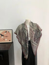 Vintage-inspired French scarf, perfect for adding a touch of elegance to outfits.