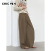 Wide leg pleated trousers in flowing polyester rayon blend with adjustable drawstring waist