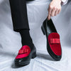 Side view of elegant black leather slip-on loafers for professional men