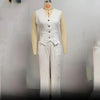 Radiant Summer Suit displayed on a hanger, showcasing the luxurious fabric texture.