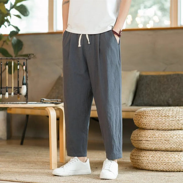 Men's breathable joggers styled for gym workout with athletic tee and trainers