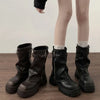 Chic women's mid-calf biker boots with buckle detail, cozy plush lining, and durable rubber sole for stylish winter wear.