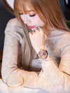 Close-up of the Timeless Whisper watch face showcasing its elegant design.