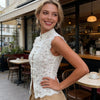 Y2K inspired black lace crop top with button-front closure and feminine detailing