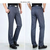 Classic men's dress pants in premium cotton, perfect for business and casual wear with a sleek straight leg design.