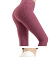 Side view of seamless high waist push-up yoga leggings in charcoal, ideal for activewear.