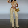 Slim-fit sequined V-neck top styled with playful tassel mini skirt