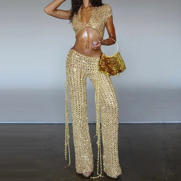 Slim-fit sequined V-neck top styled with playful tassel mini skirt