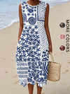 Full skirt detail on flowing bohemian floral midi sundress