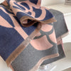 Stylish winter scarf in cashmere blend, perfect for layering.