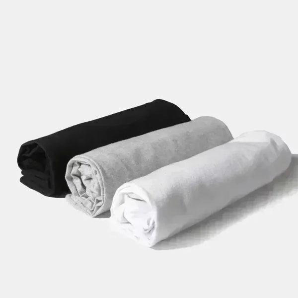 Breathe Easy Cotton Tee displayed on a hanger, highlighting its minimalist style and durable design.