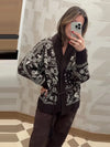 Traditional Fair Isle print cardigan with feminine tie waist accent