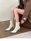 Chic women's ankle boots with zipper, high heel, pointed toe, perfect for autumn and winter fashion, stylish and comfortable.