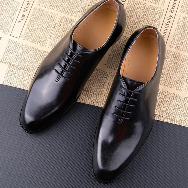 Black Oxford lace-up shoes with durable rubber outsole for all-weather wear
