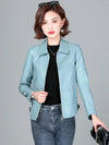 Chic women's sheepskin leather jacket with zippered front, turn-down collar, and pockets for stylish autumn layering.