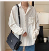 Men's Hollow Out Mesh Long-Sleeve Shirt in black and apricot, breathable polyester, tailored fit, stylish and elegant design.