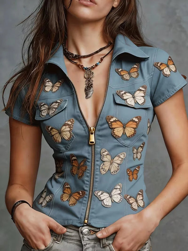 Women's short sleeve butterfly print shirt with denim-inspired pattern and chest pockets