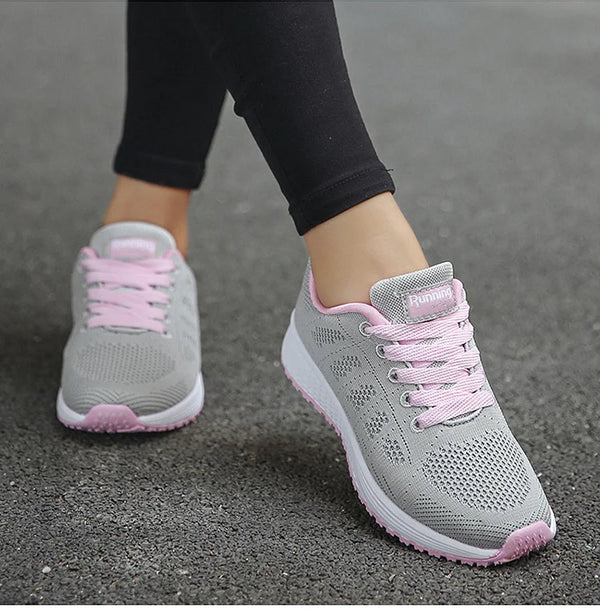 Lightweight white training shoes with multi-color details for all-day wear